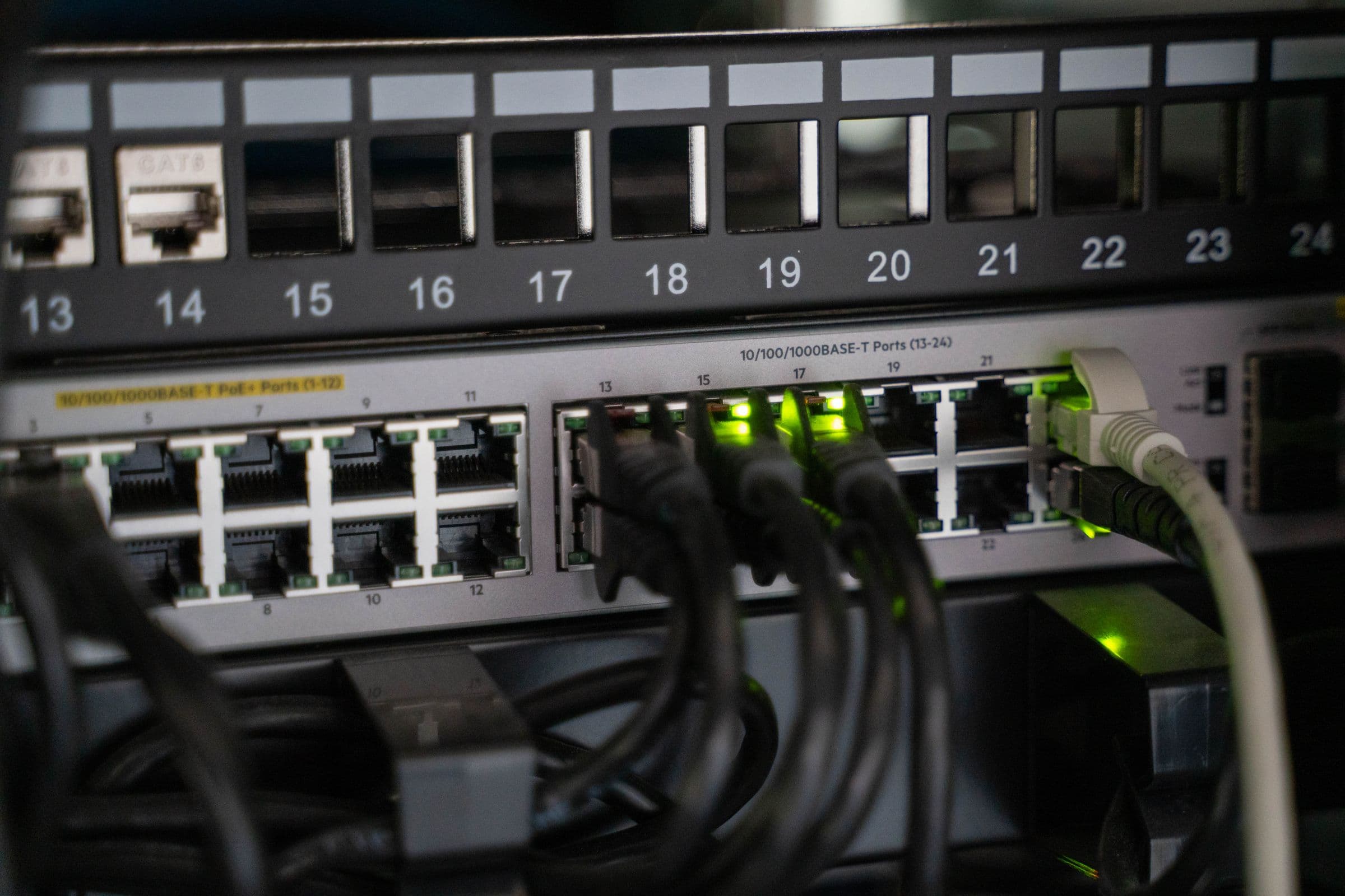 A network patch panel and switch with cables connected